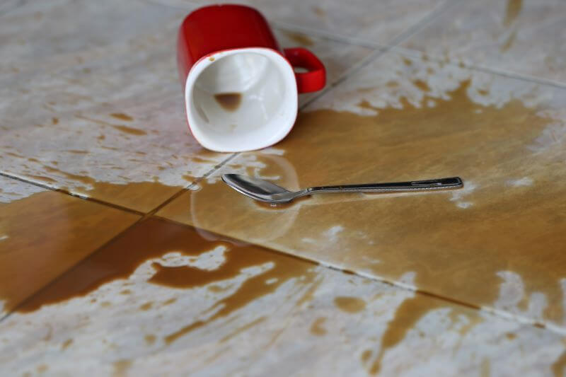 Coffee spill on tile flooring
