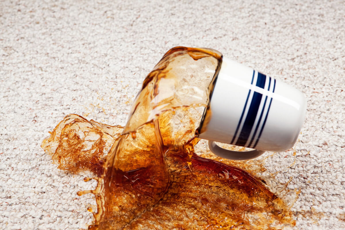 Coffee spilling on carpet image